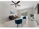Comfortable living room with a pool view and ceiling fan at 4704 Cheyenne Point Trl, Kissimmee, FL 34746