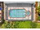 Directly above view of the screened pool and spa at 4704 Cheyenne Point Trl, Kissimmee, FL 34746