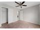 Bedroom with double door closet and ceiling fan at 4704 Cheyenne Point Trl, Kissimmee, FL 34746
