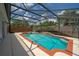 Enjoy this refreshing screened pool and spa oasis at 4704 Cheyenne Point Trl, Kissimmee, FL 34746