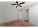 Spacious bedroom with ceiling fan and large closet at 4704 Cheyenne Point Trl, Kissimmee, FL 34746