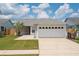 One story home with a two car garage and well maintained lawn at 4704 Cheyenne Point Trl, Kissimmee, FL 34746