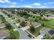 Aerial view of a home's location within a residential neighborhood at 12348 Hammock Pointe Cir, Clermont, FL 34711