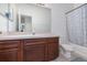 Bathroom with single vanity and shower/tub combo at 6604 S Goldenrod Rd # 100B, Orlando, FL 32822