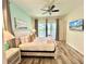 Spacious main bedroom with water views and large TV at 8125 Surf St, Kissimmee, FL 34747