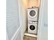 Stackable washer and dryer in a closet at 8125 Surf St, Kissimmee, FL 34747