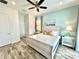Main bedroom with water views and private balcony access at 8125 Surf St, Kissimmee, FL 34747