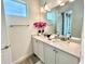 Double vanity bathroom with modern finishes and a bright aesthetic at 8125 Surf St, Kissimmee, FL 34747