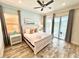 Main bedroom with water views and private balcony access at 8125 Surf St, Kissimmee, FL 34747