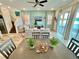 Bright living room with water views, comfortable seating and a dining area at 8125 Surf St, Kissimmee, FL 34747