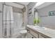 Simple bathroom with shower/tub combo and updated vanity at 10604 Se 146Th Ln, Summerfield, FL 34491
