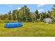 Large backyard with above ground pool and shed at 10604 Se 146Th Ln, Summerfield, FL 34491