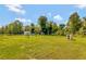 Large backyard with shed and fenced area at 10604 Se 146Th Ln, Summerfield, FL 34491