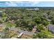 Property view showcasing surrounding homes and lake at 233 S 4Th St, Lake Mary, FL 32746