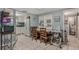 Eat-in kitchen with white cabinetry, granite countertops, and a breakfast nook at 233 S 4Th St, Lake Mary, FL 32746