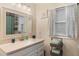 Clean bathroom with a vanity, mirror, and shower at 233 S 4Th St, Lake Mary, FL 32746
