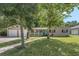 House exterior with two-car garage and front yard at 233 S 4Th St, Lake Mary, FL 32746