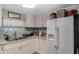Efficient kitchen featuring ample cabinetry and a double sink at 233 S 4Th St, Lake Mary, FL 32746