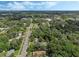 Aerial view showing home, lake, and surrounding area at 233 S 4Th St, Lake Mary, FL 32746