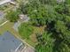 Aerial view showcasing the home and surrounding trees at 233 S 4Th St, Lake Mary, FL 32746