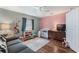 Cozy bedroom with hardwood floors and plenty of closet space for storage at 233 S 4Th St, Lake Mary, FL 32746