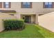 Private backyard with grassy area and hedge at 8110 Roseville Rd, Davenport, FL 33896
