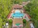 Resort-style pool with a spa, sundeck, and lounge area at 8110 Roseville Rd, Davenport, FL 33896