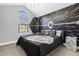 bedroom with Star Wars themed wall and a comfortable bed at 8110 Roseville Rd, Davenport, FL 33896