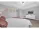 Main bedroom with king bed, large TV, and ample closet space at 8110 Roseville Rd, Davenport, FL 33896