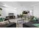 Open concept living and dining area with kitchen views at 8110 Roseville Rd, Davenport, FL 33896
