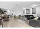 Open concept living area, dining area and kitchen at 8110 Roseville Rd, Davenport, FL 33896