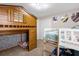 bedroom with a wooden bunk bed and playful decor at 8110 Roseville Rd, Davenport, FL 33896