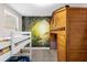 bedroom with a tree mural and a wooden bunk bed at 8110 Roseville Rd, Davenport, FL 33896