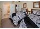 Two twin beds with Parisian-themed bedding at 320 Henley Cir, Davenport, FL 33896