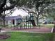 playground with slides and climbing structures at 320 Henley Cir, Davenport, FL 33896
