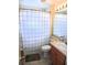 Clean bathroom with shower/tub combo and updated vanity at 320 Henley Cir, Davenport, FL 33896