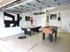Game room with foosball and air hockey tables at 320 Henley Cir, Davenport, FL 33896