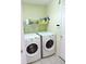Bright laundry room with washer and dryer at 320 Henley Cir, Davenport, FL 33896