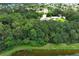 Aerial view of property with waterfront access and nearby homes at 2341 Celery Ave, Sanford, FL 32771