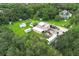 Aerial view of a property showing a large workshop and surrounding land at 2341 Celery Ave, Sanford, FL 32771