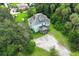 Aerial view of a large home and expansive property with lush landscaping at 2341 Celery Ave, Sanford, FL 32771