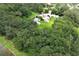 Aerial view of property with waterfront access and lush vegetation at 2341 Celery Ave, Sanford, FL 32771