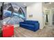 Space-themed ' play area with a pull-out sofa and mural at 7525 Sunflower Cir, Kissimmee, FL 34747