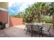Enjoy outdoor dining on this brick patio with grill and seating at 7525 Sunflower Cir, Kissimmee, FL 34747