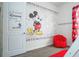 Mickey Mouse themed bedroom with beanbag chair at 7525 Sunflower Cir, Kissimmee, FL 34747