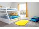 Bunk bed bedroom with a fun Minion theme at 7525 Sunflower Cir, Kissimmee, FL 34747