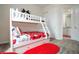 Mickey Mouse themed bedroom with bunk beds and a built-in drawer at 7525 Sunflower Cir, Kissimmee, FL 34747