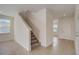 Modern staircase leading to second floor at 33239 Country House Dr, Sorrento, FL 32776