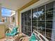 Balcony with patio furniture and view of the surrounding area at 7502 Seven Eagles Way, Reunion, FL 34747