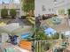 Two-story townhome with light yellow exterior, landscaping, and parking at 7502 Seven Eagles Way, Reunion, FL 34747